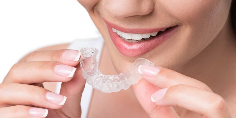 Dr Roy orthodontiste Saint Genis Pouilly gouttieres INVISALIGN